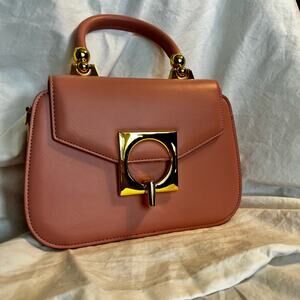Elegant Pink Handbag with Gold Accents